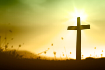 Wall Mural - Ascension day concept: The cross on meadow autumn sunrise background