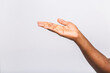 © denis_vermenko - African american black man hand hanging something blank isolated on a white background. Close-up.