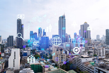  Social media icons hologram over panorama city view of Bangkok, Asia. The concept of people networking and connections. Double exposure.