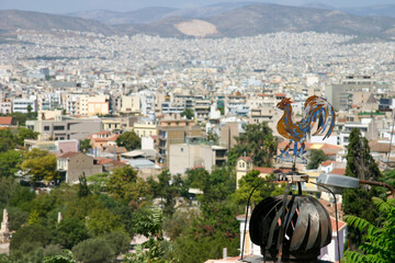 Wall Mural - Weather vane overlooking the city of Athens