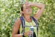female walker suffering from heat exhaustion