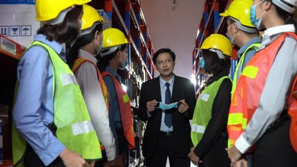business man or manager teaching how to wearing protective medical face mask in meeting at large war