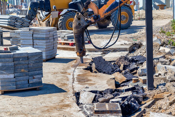 Wall Mural - Repairing works, breaking the asphalt pavement