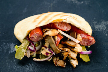 Sticker - Burritos wraps with minced beef and vegetables on a wooden background