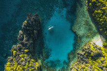 Aerial View Of Traditional Outrigger Boat In El Nido, Philippines.