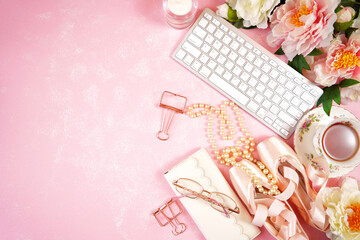 Wall Mural - Pointe Ballet Shoes Aesthetic theme desktop workspace background on stylish pink textured background. Top view blog hero header creative composition flat lay. Negative copy space.