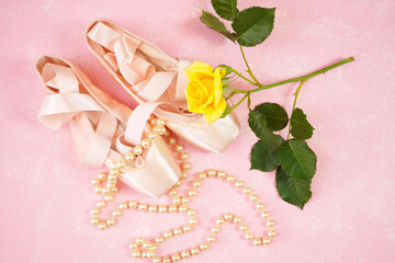 Wall Mural - Pointe Ballet Shoes Aesthetic theme desktop workspace background on stylish pink textured background. Top view blog hero header creative composition flat lay.