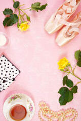 Wall Mural - Pointe Ballet Shoes Aesthetic theme desktop workspace background on stylish pink textured background. Top view blog hero header creative composition flat lay. Negative copy space.