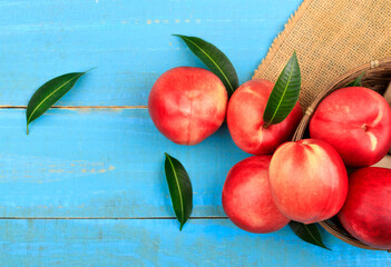 Sweet nectarine on wooden background