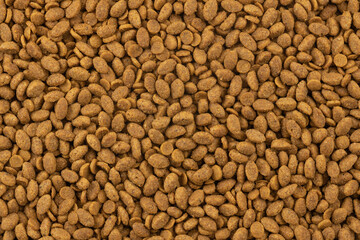 Wall Mural - Food for animals background. Dry cat and dog food texture. Pet meal background close up