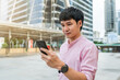© geargodz - man using smartphone in city