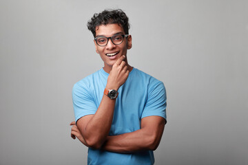 Wall Mural - Portrait of an excited young man of Indian origin