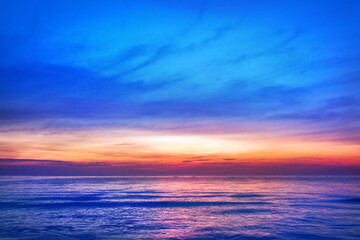 Canvas Print - Beautiful pink sunset, blue sky, purple sea background, blurred watercolor sunrise, quiet ocean beach landscape, peaceful morning seascape, idyllic dawn nature, calm soft dusk & gentle sun light glow