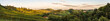 Sunset panorama of wine street on Slovenia, Austria border in Styria. Fields of grapevines.