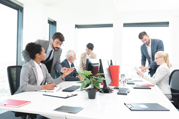 Business colleagues working at office