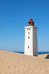 Wall Mural - Rubjerk Knude Fyr, famous lighthouse in the North Sea dunes of Denmark