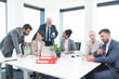 © focusandblur - Business people discussing work at office meeting