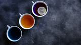 Fototapeta Mapy - different types of tea on a dark background