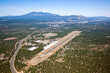 Airport with the city of Flagstaff and Mt. Humphreys Peak in the distance