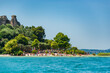 Scenic view of the Jamaica beach next to the archaeological site of Grotte di Catullo in Lake Garda Sirmione Italy