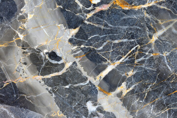 Wall Mural - Gold and yellow patterned natural of dark gray marble (Gold Russia) texture for product design.
