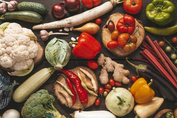 Wall Mural - Ripe autumn vegetables on a wooden table, cooking of healthy food.