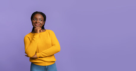 Nice Offer. Curious African Woman Looking Away At Copy Space, Purple Background