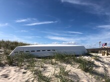 A Lifeboat Turned Upside Down On The Beach At Cupsogue Beah In West Hampton Beach, Long Island, New York