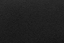 Water Droplets On Black Background