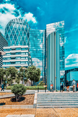 Wall Mural - PARIS, FRANCE - JULY 06, 2016 :La Defense, Business Quarter with businessmen in the streets, area of Paris,  French financial center with skyscrapers and modern buildings.