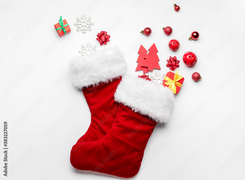 Composition with Christmas socks on white background