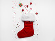 Christmas sock with decor on white background