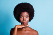 © deagreez - Closeup headshot photo of dark skin big volume hairdo lovely perfect woman hand chin after anti-aged procedures calm glance beauty concept naked isolated blue color background