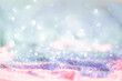 Abstract bright glitter lights colorful bokeh background in pastel blue pink and purple color