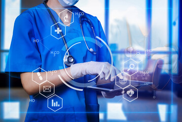 Medicine doctor and stethoscope using tablet with icon medical network connection on virtual Modern medical technology concept.
