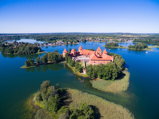 Wall Mural - Aerial view of beautiful Gothic style red brick castle on an island on Galve Lake, Trakai, Lithuania