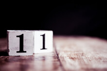 Number 11 Isolated On Dark Background- 3D Number Eleven Isolated On Vintage Wooden Table