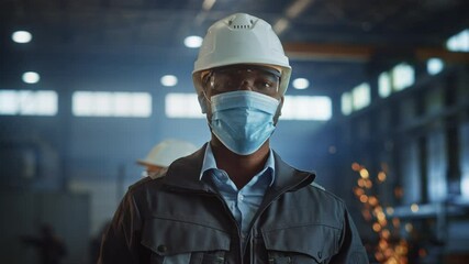 Aufkleber - Professional Heavy Industry Engineer/Worker Wearing Safety Face Mask, Uniform, Glasses and Hard Hat in a Steel Factory. African American Industrial Specialist Standing in Metal Construction Facility.