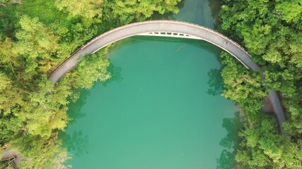 Wall Mural - landscape of path over water in aerial view