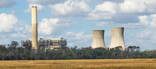 Two Cooling Towers And A Nuclear Power Generating Plant At The St Johns River Power Park, Near Oceanville, Florida.