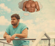 © New Africa - Overweight man dreaming about muscular body outdoors. Weight loss concept