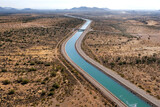 Irrigation canal winding thru the Arizona desert