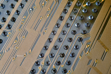 pins on the back of the motherboard close-up.