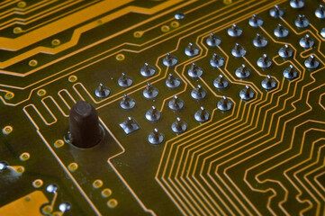 pins on the back of the motherboard close-up.