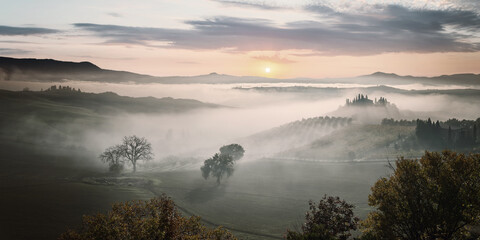 Wall Mural - autumn fog in valley on sunrise