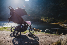 3 Wheel Baby Stroller In Mountains