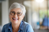 Fototapeta Pomosty - portrait of a beautiful smiling 55 year old woman with white hair