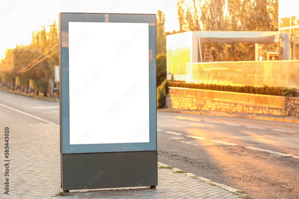 Blank advertising billboard on city street