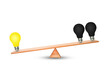 © Angkana - Business Idea and Innovation Concept : Bright yellow light bulb outweigh more than black light bulb on wooden balance scales with white background.