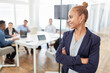 © Robert Kneschke - Erfolgreiche Business Frau vor Start-Up Team